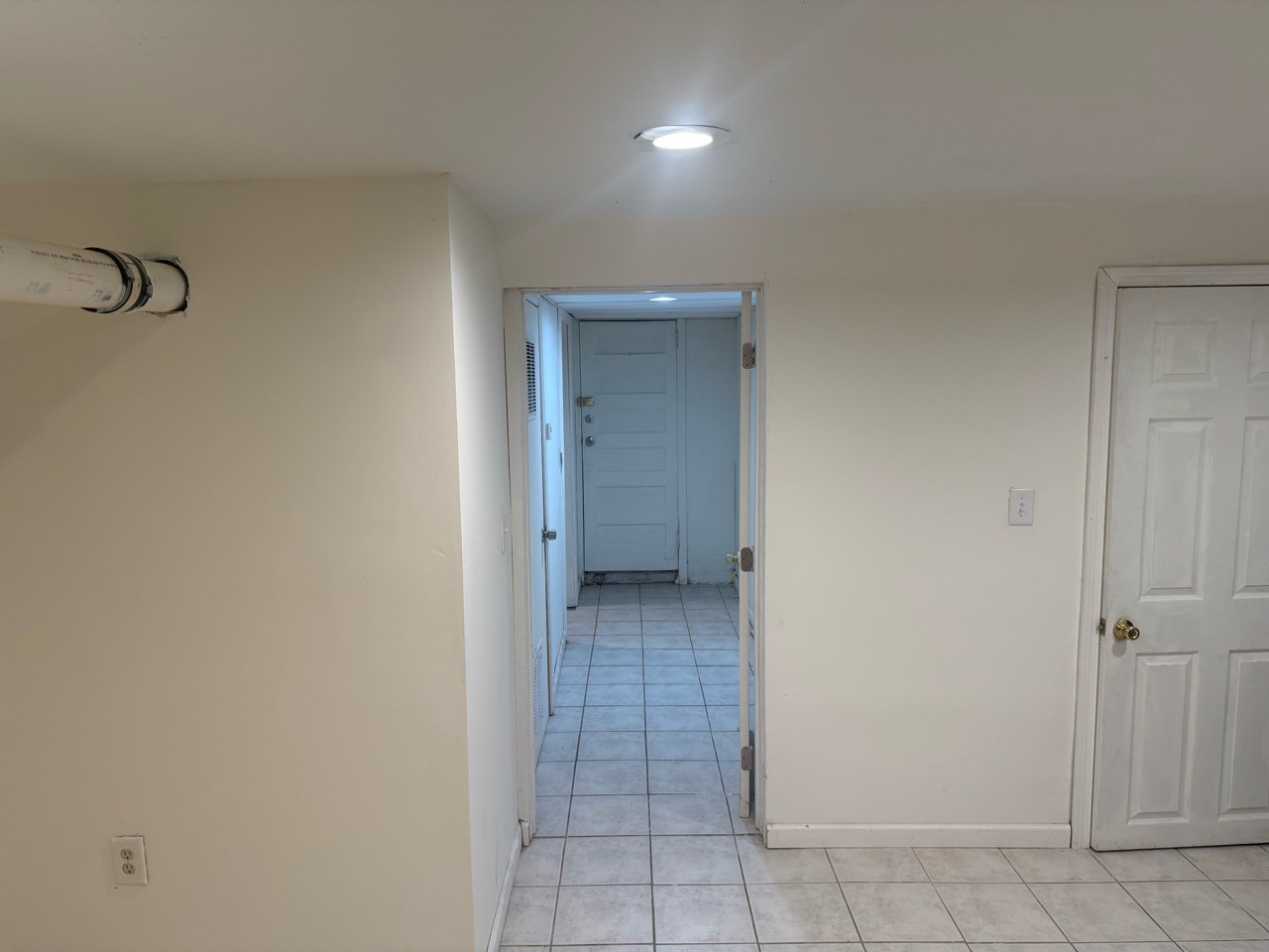 Approved basement entrance & hallway photo for Floor 1 apartment