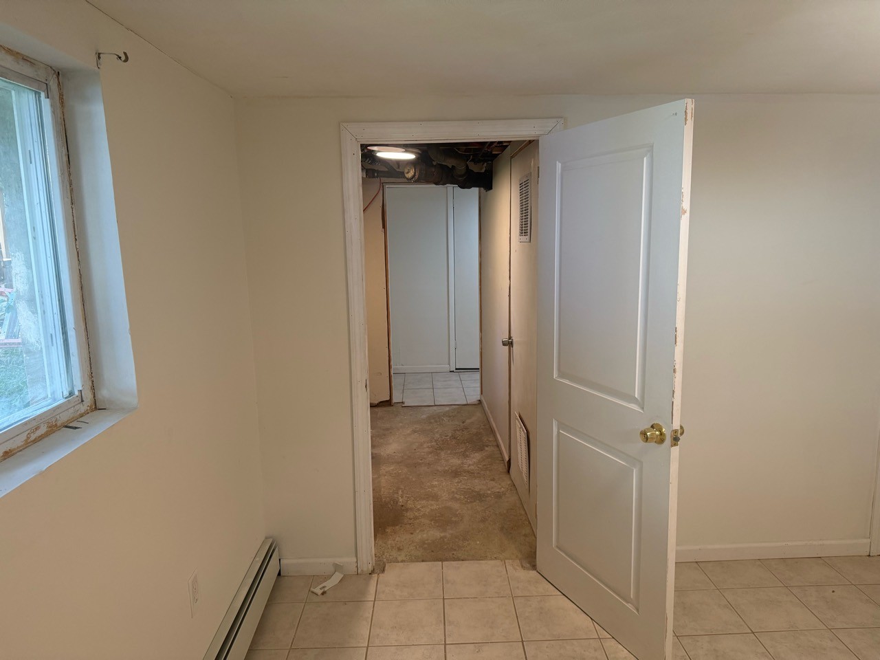 Approved basement entrance & hallway photo for Floor 1 apartment