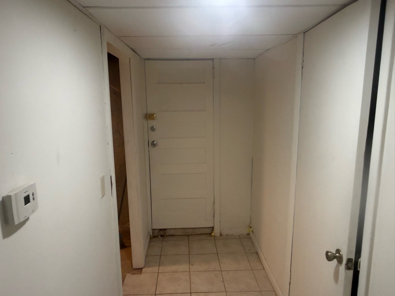 Approved basement entrance & hallway photo for Floor 1 apartment