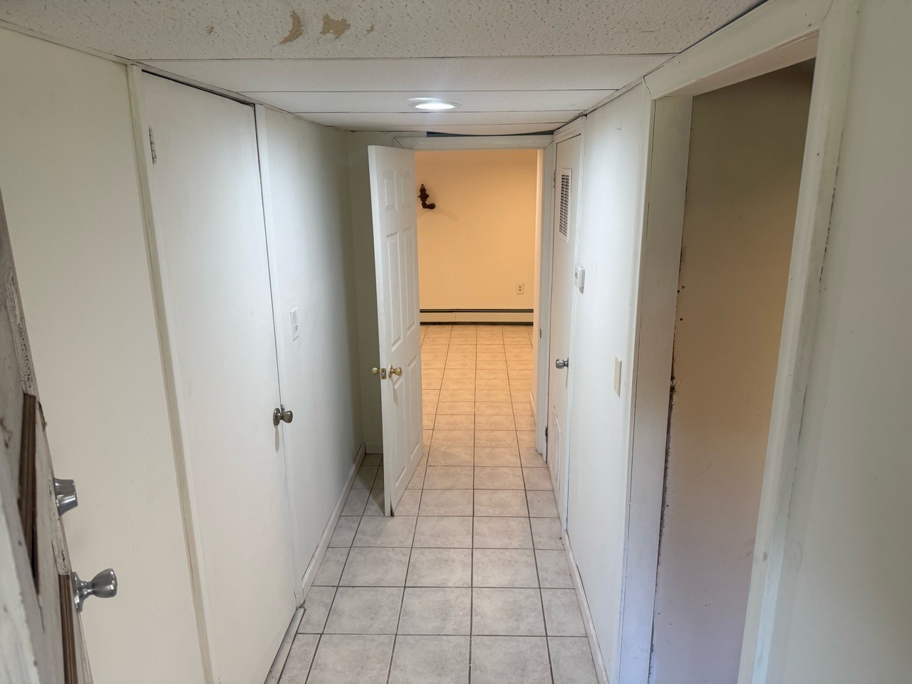Approved basement entrance & hallway photo for Floor 1 apartment